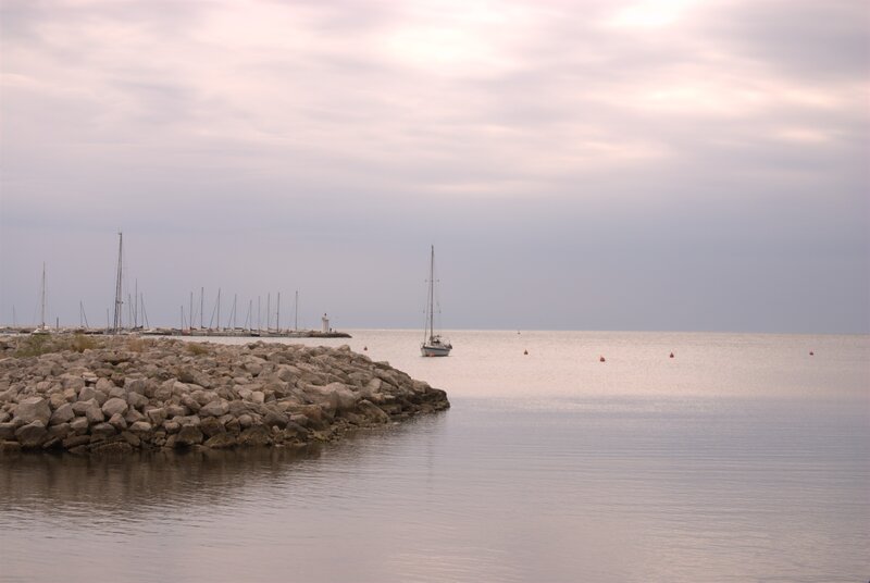 Sailboat in calm harbor