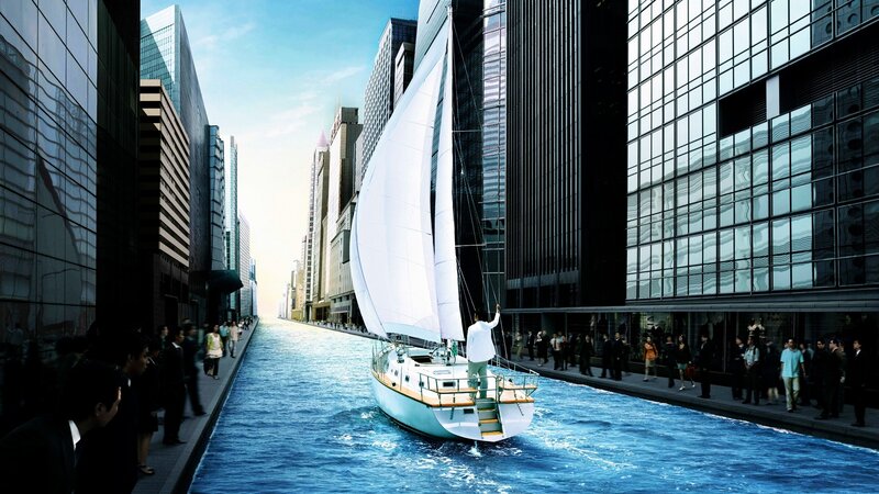 Sailboat in city canal