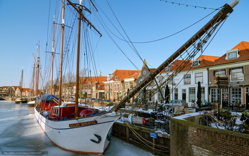 Sailboat in Frozen Harbor