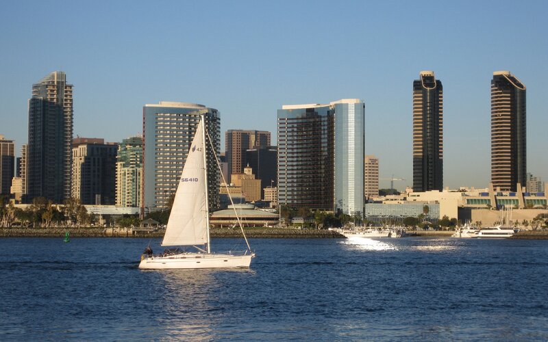 Sailboat in Harbor — Blue, Serene, Afternoon, Photograph, Skyscraper, Cityscape