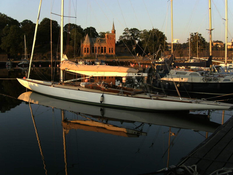 Sailboat in Harbor — White