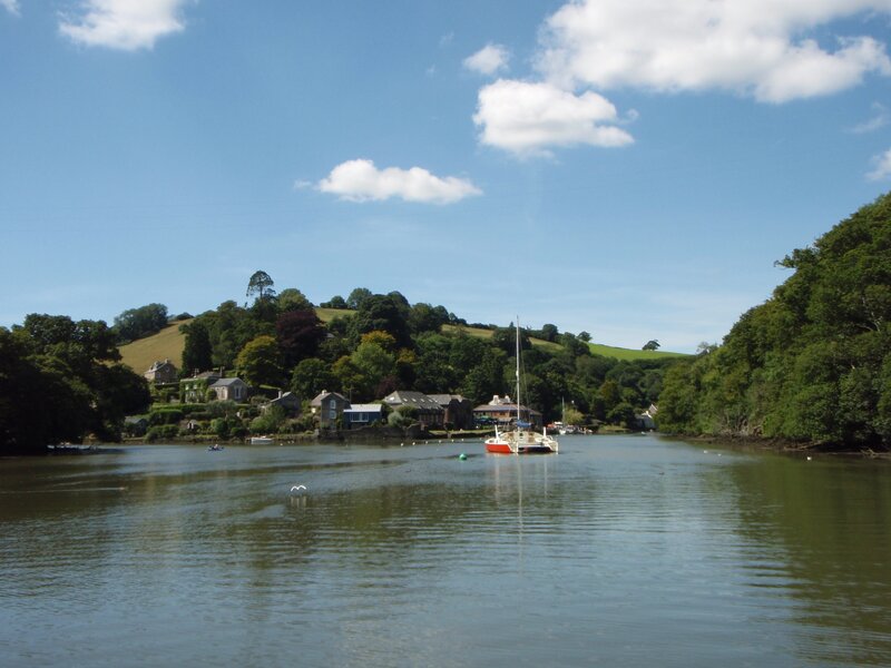 Sailboat in River — Blue