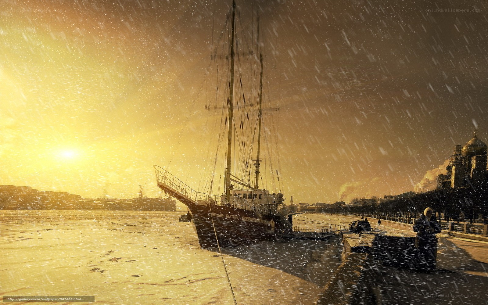 sailboat in snowy sunset