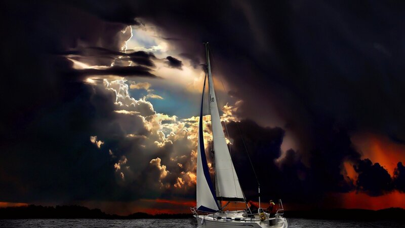 Sailboat in Stormy Sky