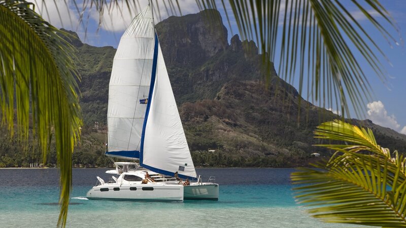 Sailboat in tropical bay