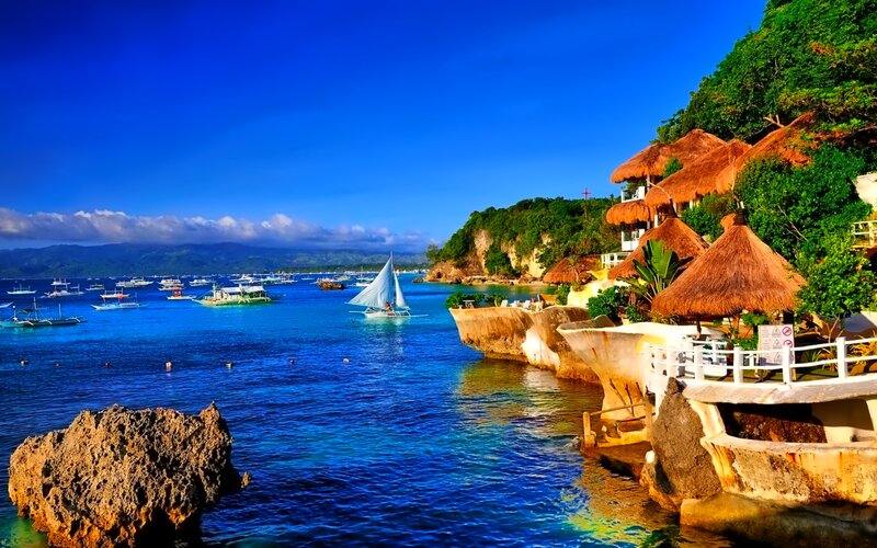 Sailboat in Tropical Bay — Blue, Serene, Afternoon, Photograph, Boats