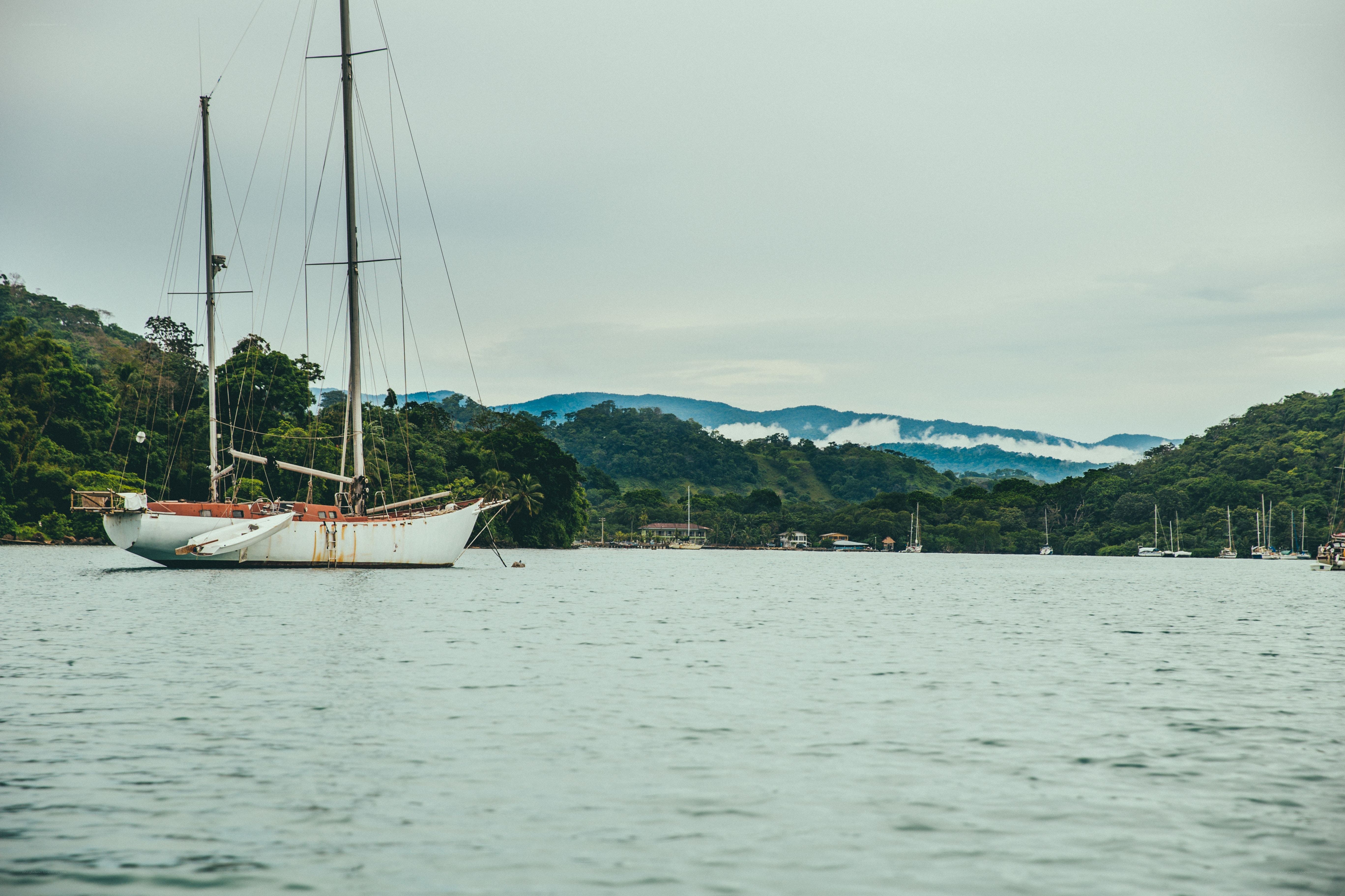 sailboat in tropical bay