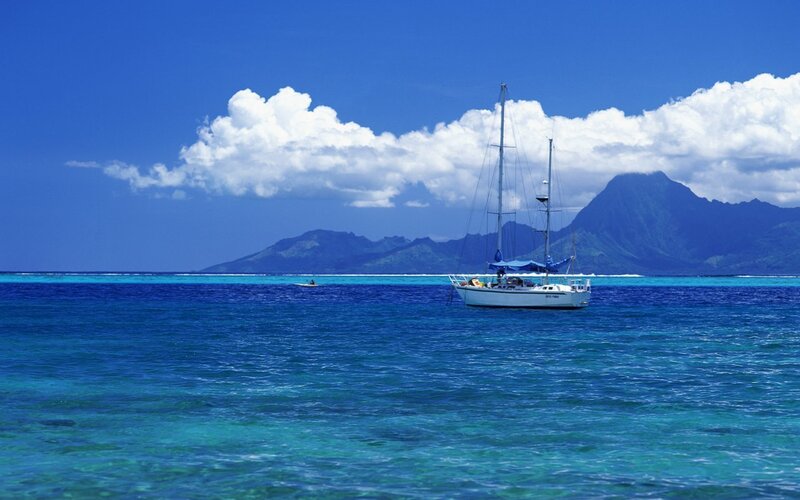 Sailboat in tropical waters