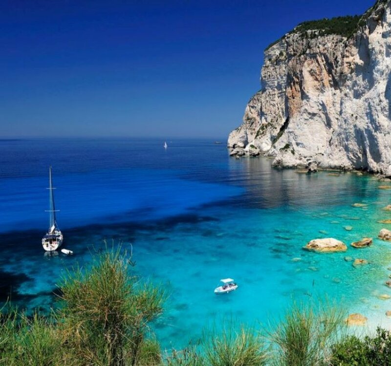 Sailboat in Turquoise Cove — Blue