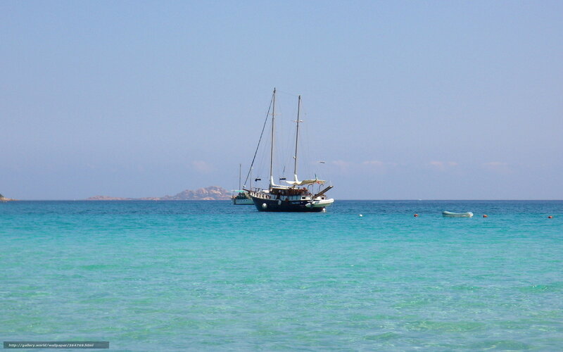 Sailboat in turquoise sea