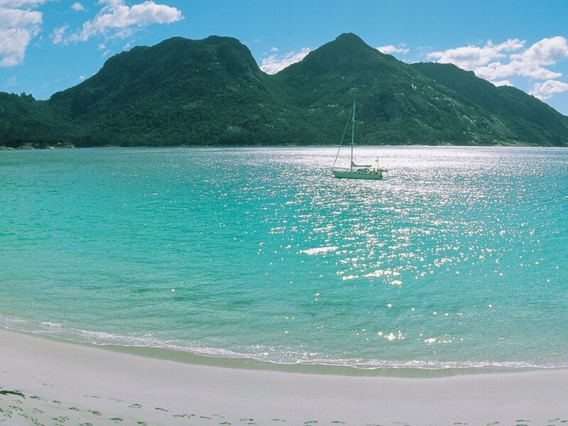 Sailboat in Turquoise Water — Serene