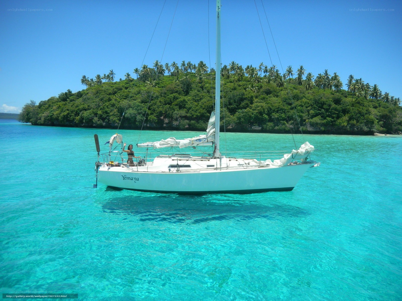 Sailboat in turquoise waters