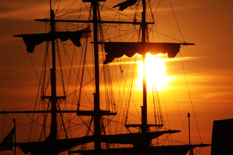 Sailboat Masts at Sunset — Orange, Dramatic, Photograph