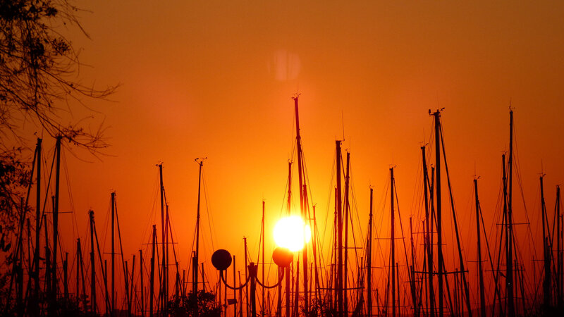 Sailboat Masts at Sunset — Orange, Dramatic