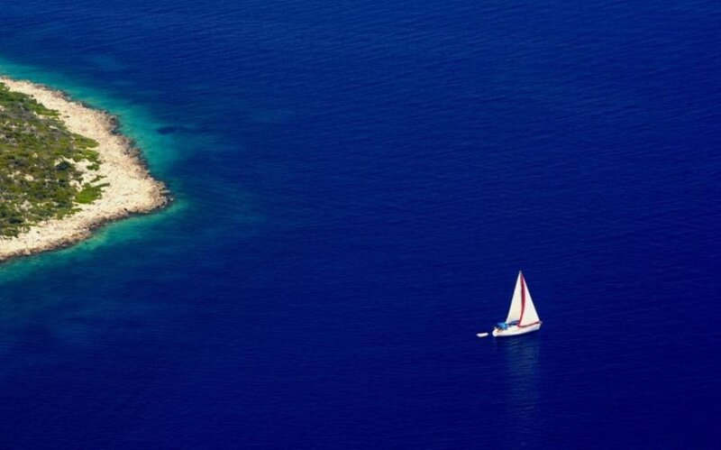 Sailboat near a coastal island