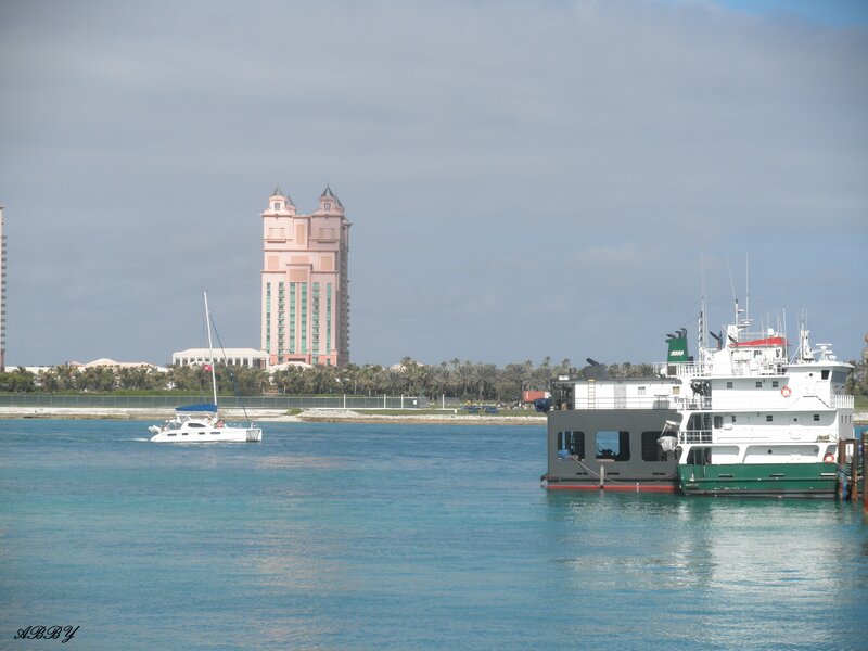 Sailboat Near Ferry