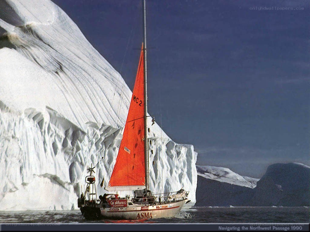 Sailboat near iceberg