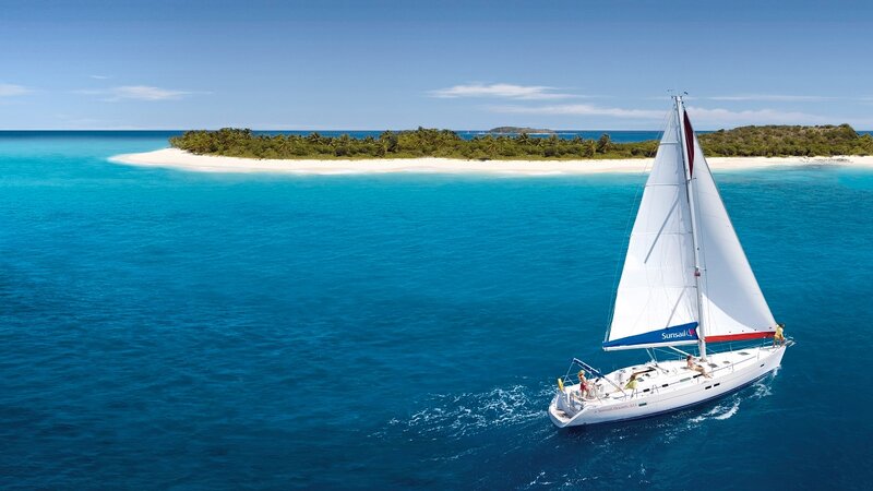 Sailboat Near Island — Blue, Serene, Afternoon, Photograph