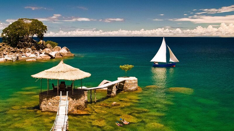 Sailboat Near Island — Blue, Serene