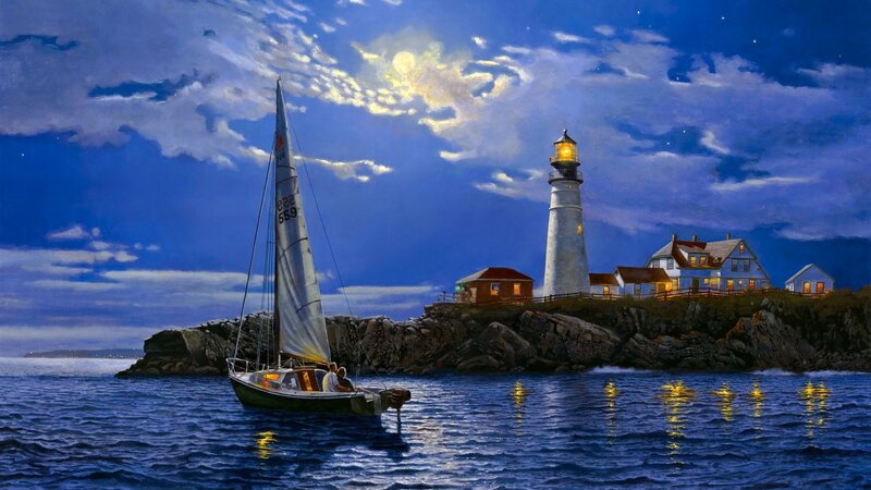 Sailboat near lighthouse at night