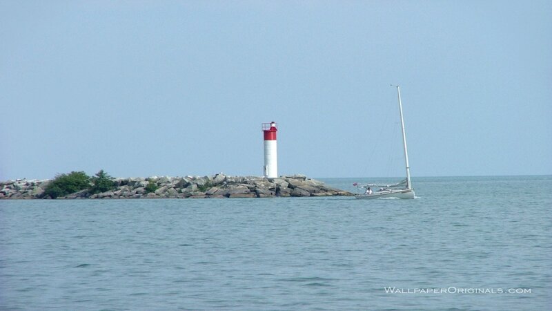 Sailboat Near Lighthouse — Blue, Calm, Afternoon, Photograph