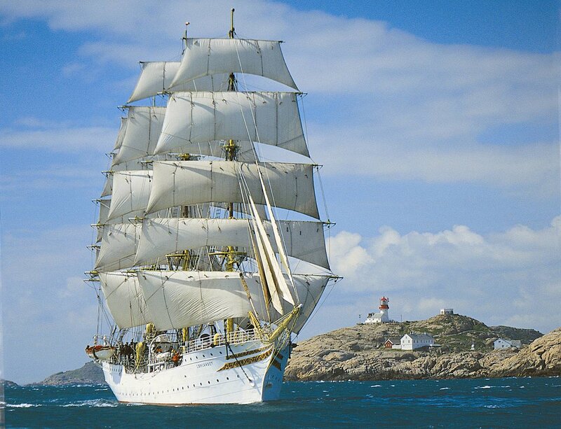 Sailboat Near Lighthouse — Blue, Serene, Afternoon, Photograph, Island