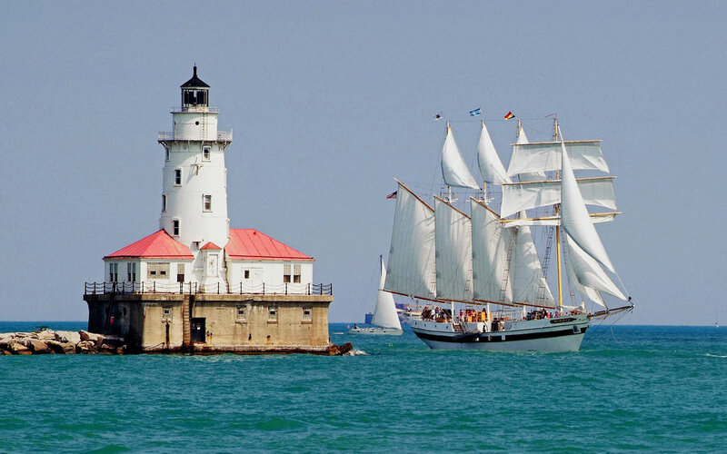 Sailboat Near Lighthouse — Blue, Serene, Afternoon