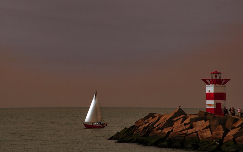 Sailboat Near Lighthouse — Red