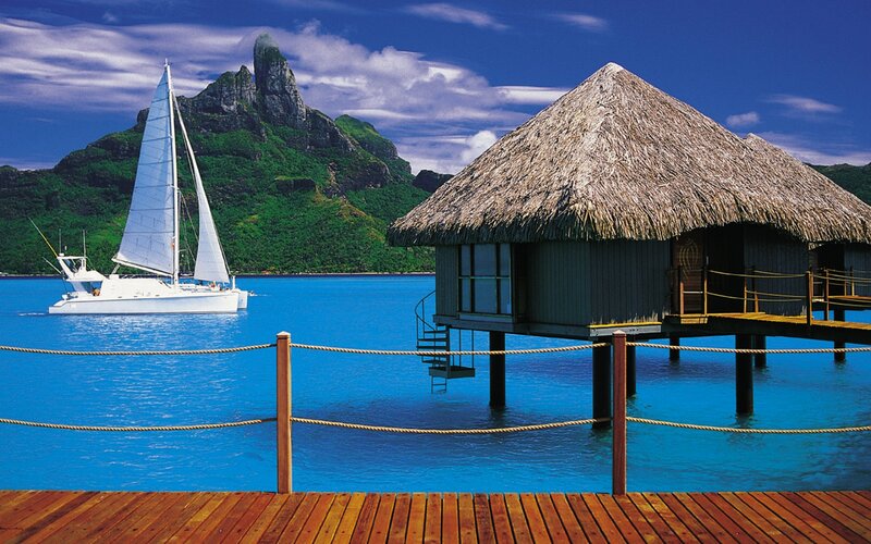 Sailboat Near Overwater Bungalow — Blue