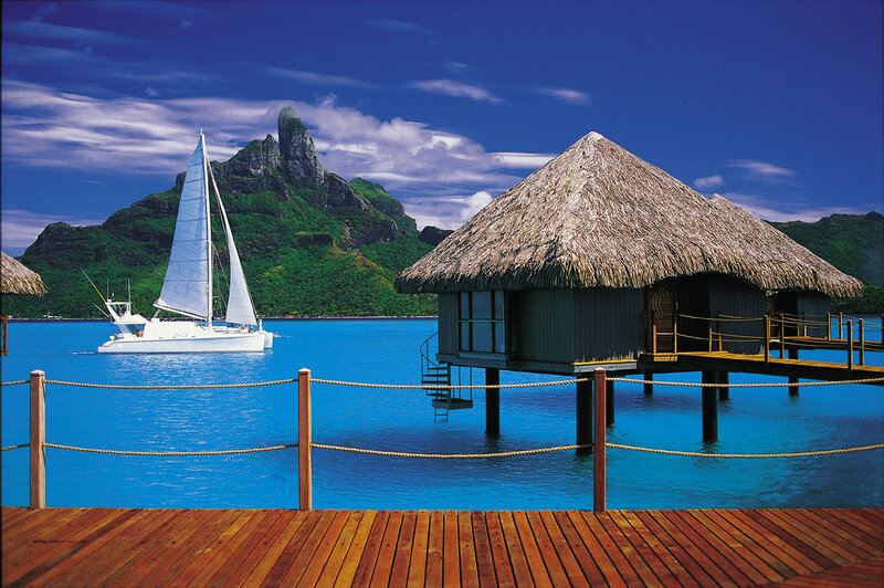 Sailboat Near Overwater Bungalow