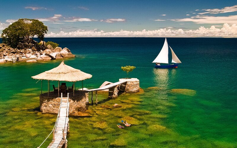 Sailboat near tropical island