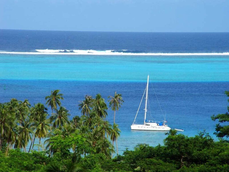 Sailboat near tropical island