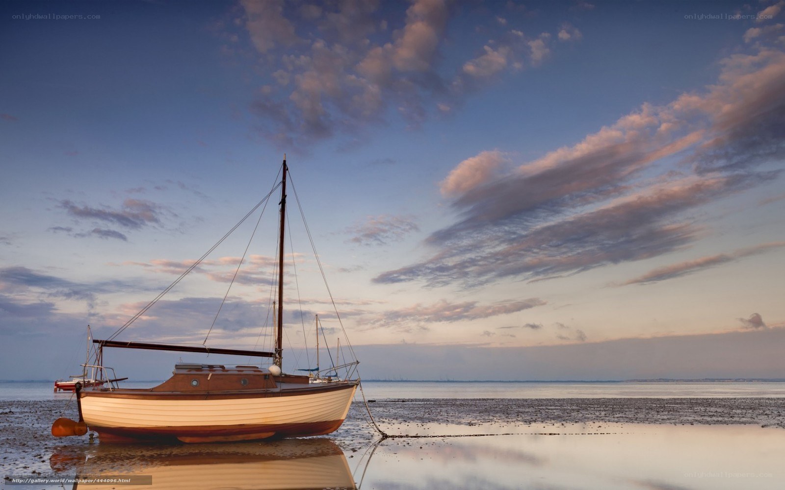 Sailboat on a calm beach