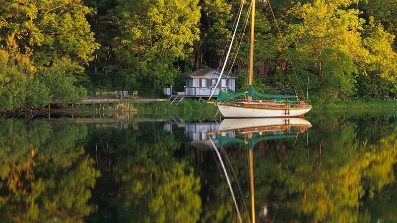 Sailboat on a calm lake