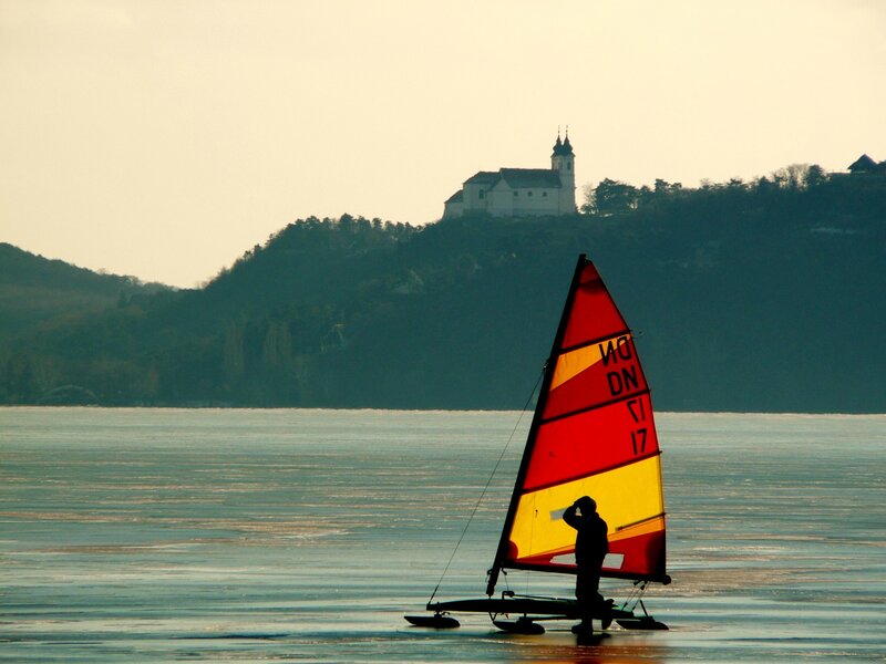 Sailboat on a calm lake