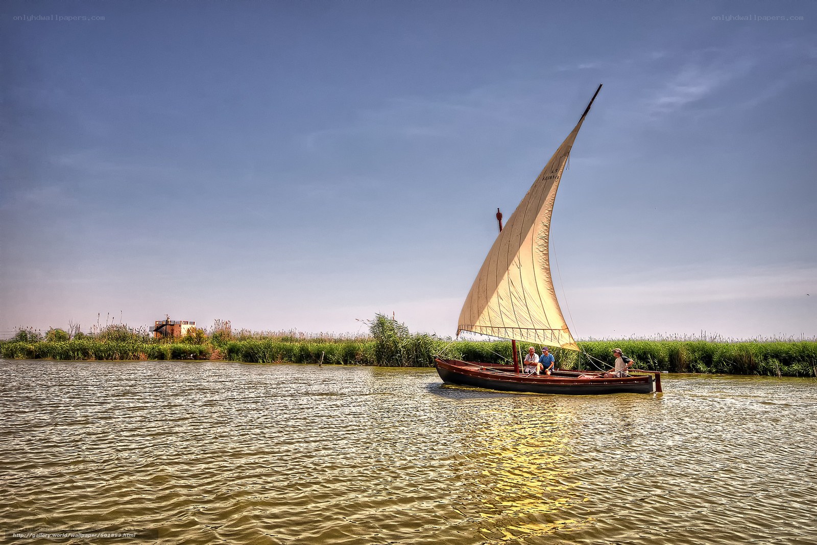 Sailboat on a calm river