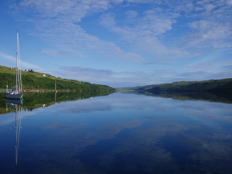 Sailboat on a calm Scottish loch