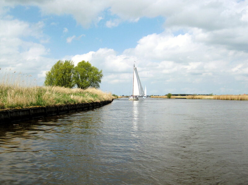 Sailboat on a Canal