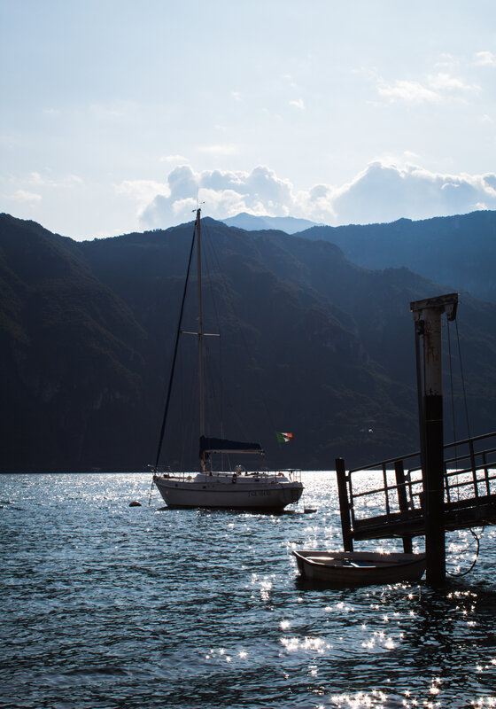 Sailboat on a Lake — Blue, Serene, Afternoon, Photograph, Mountains, Dock