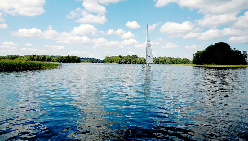 Sailboat on a Lake — Blue, Serene, Afternoon, Photograph, Trees