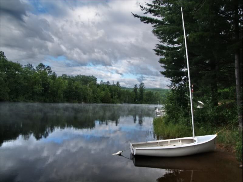 Sailboat on a Lake — Blue, Serene, Morning