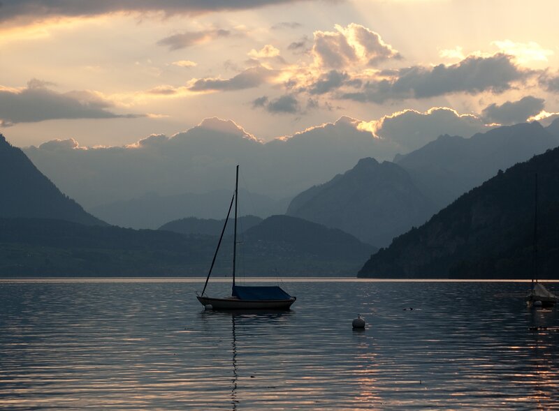 Sailboat on a Lake — Blue, Serene, Sunset, Photograph