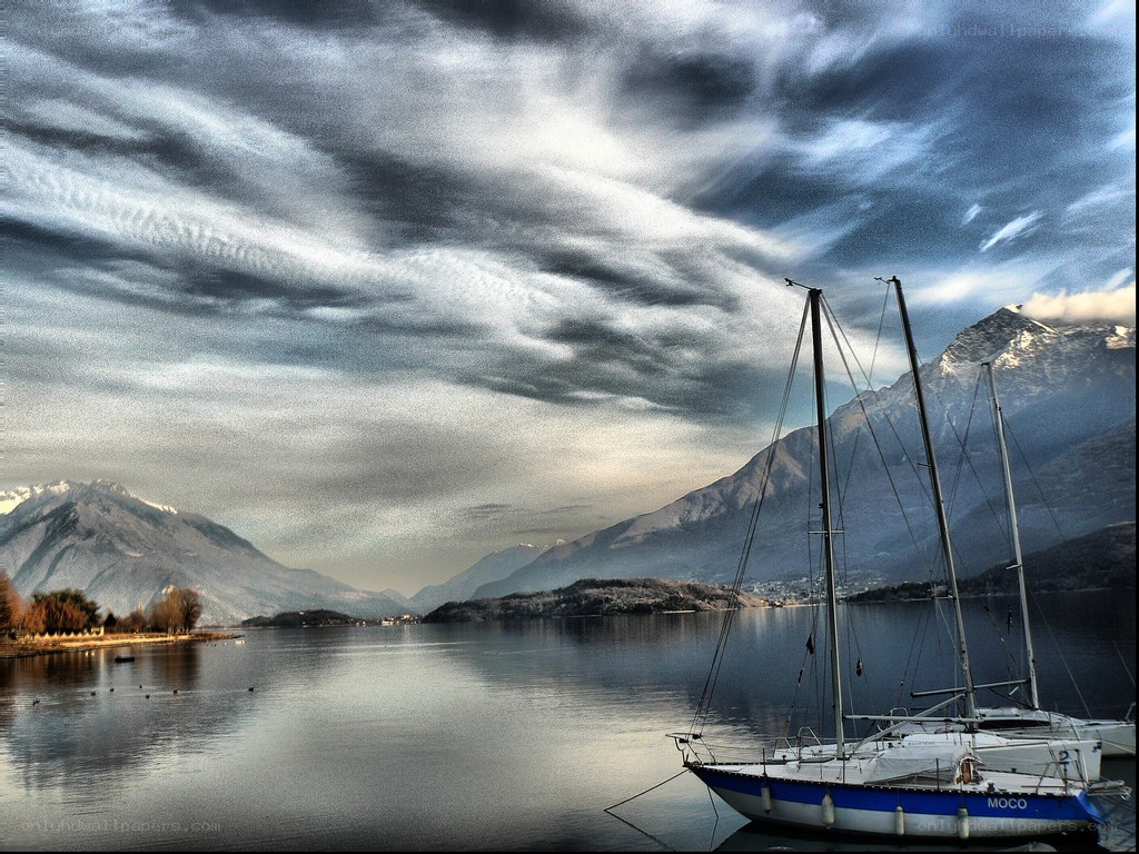 Sailboat on a lake with mountains