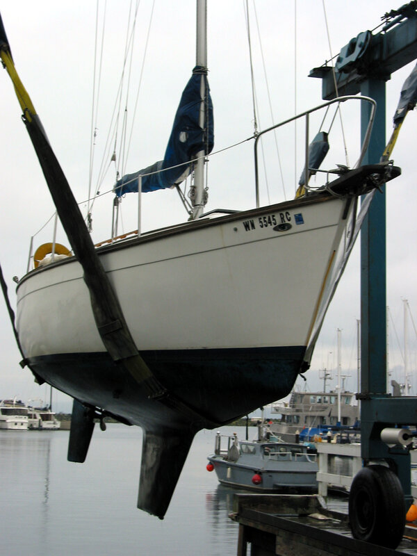 Sailboat on a lift at the marina