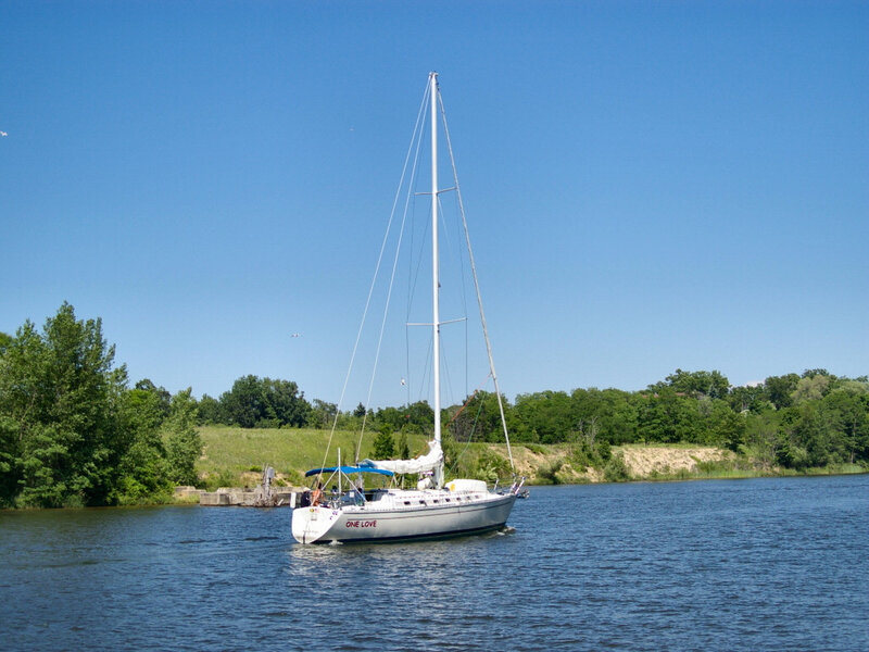 Sailboat on a River — Blue
