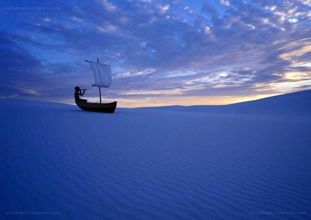 Sailboat on a sand dune