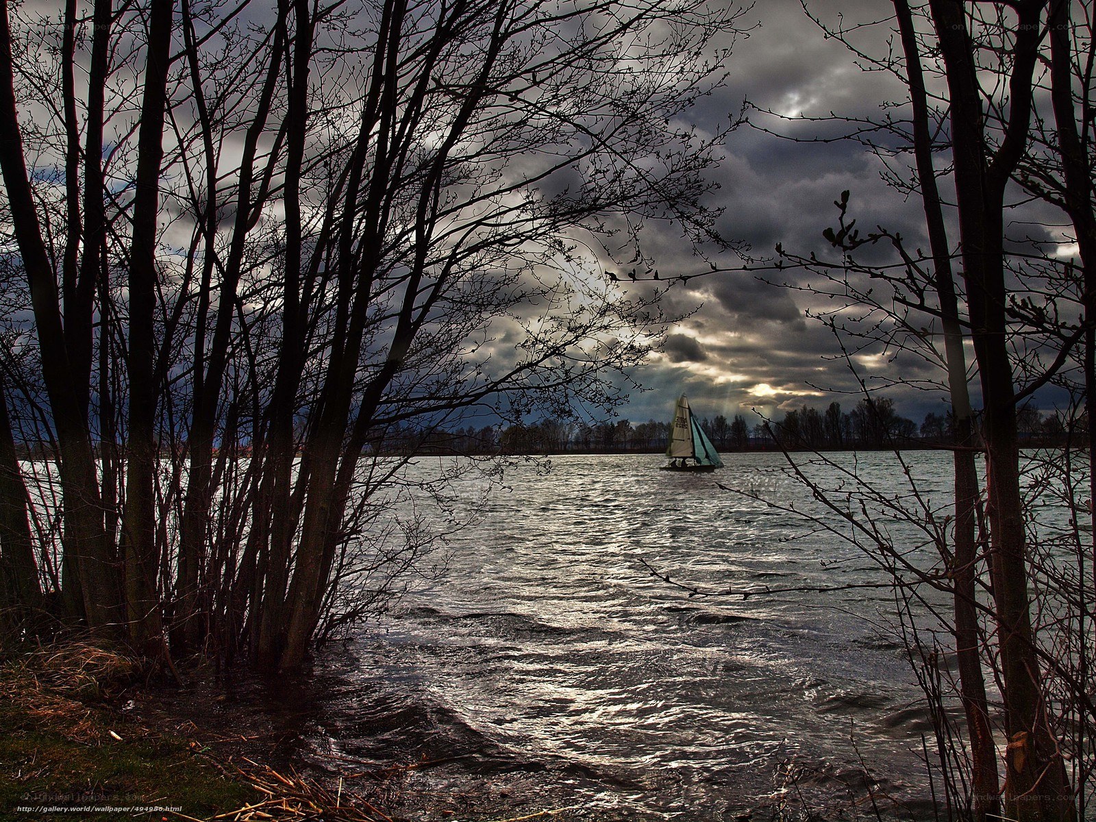 Sailboat on a stormy lake