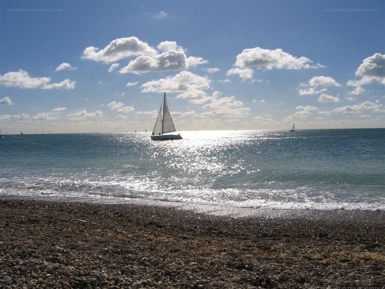 Sailboat on a sunny beach