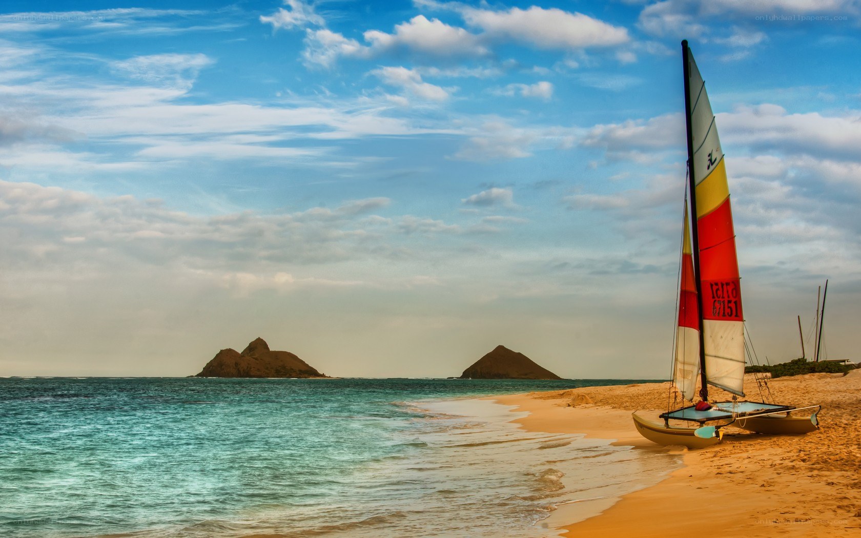 Sailboat on a tropical beach