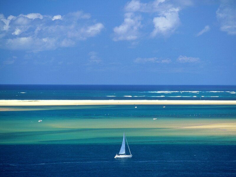 Sailboat on a tropical lagoon